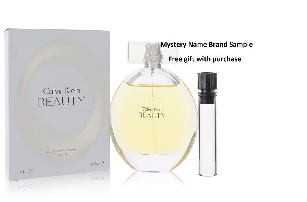 Beauty by Calvin Klein Eau De Parfum Spray 3.4 oz And a Mystery Name brand sample vile