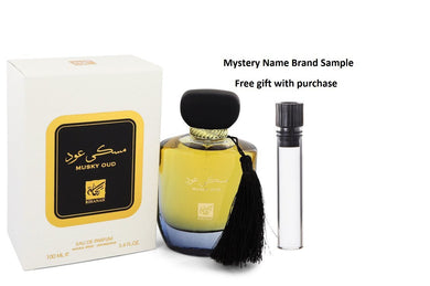 Musky Oud by Rihanah Eau De Parfum Spray (Unisex) 3.4 oz And a Mystery Name brand sample vile