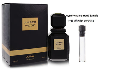 Ajmal Amber Wood by Ajmal Eau De Parfum Spray (Unisex) 3.4 oz And a Mystery Name brand sample vile