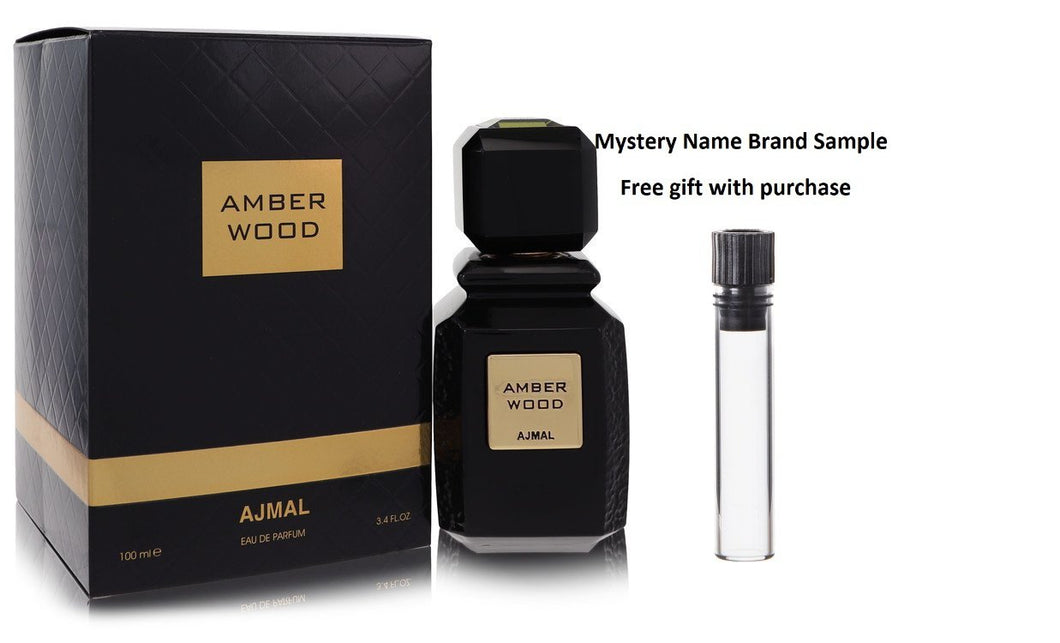 Ajmal Amber Wood by Ajmal Eau De Parfum Spray (Unisex) 3.4 oz And a Mystery Name brand sample vile