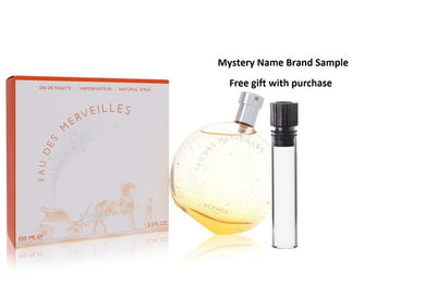 Eau Des Merveilles by Hermes Eau De Toilette Spray 3.4 oz And a Mystery Name brand sample vile