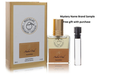 Nicolai Amber Oud by Nicolai Eau De Parfum Spray 1 oz And a Mystery Name brand sample vile