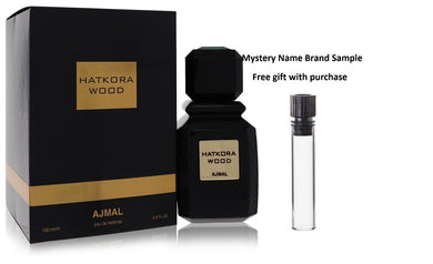 Hatkora Wood by Ajmal Eau De Parfum Spray (Unisex) 3.4 oz And a Mystery Name brand sample vile