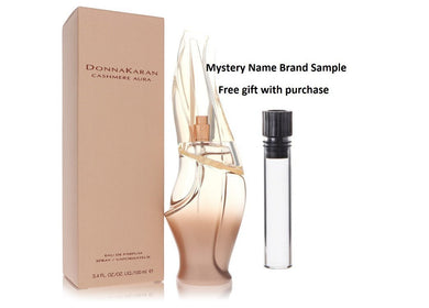 Cashmere Aura by Donna Karan Eau De Parfum Spray 3.4 oz And a Mystery Name brand sample vile