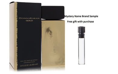 Donna Karan Gold by Donna Karan Eau De Parfum Spray 3.4 oz And a Mystery Name brand sample vile