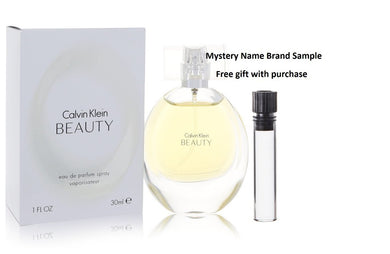 Beauty by Calvin Klein Eau De Parfum Spray 1 oz And a Mystery Name brand sample vile