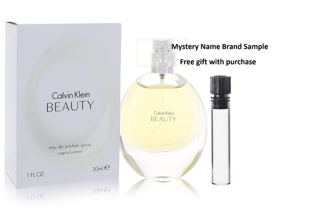 Beauty by Calvin Klein Eau De Parfum Spray 1 oz And a Mystery Name brand sample vile